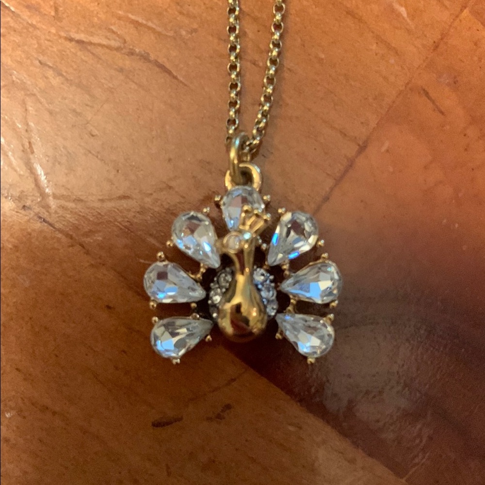 Juicy Couture Elegant Gold and Silver Peacock Pendant Necklace